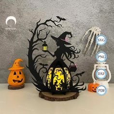 a halloween scene with pumpkins, jack - o'- lantern and witch on the tree