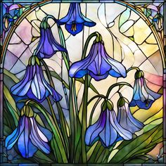 a stained glass window with blue flowers in it