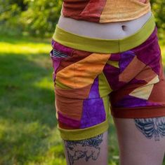 Made to Order-One of a kind patchwork short shorts made with various KNIT fabrics and include two pockets. Model pictured is size XS for reference. Fitted Patchwork Shorts For Summer, Summer Festival Shorts With Patchwork, Hippie Patchwork Shorts For Festival, Fitted Cotton Shorts For Festivals, Patchwork Short Bottoms For Festival, Multicolor Patchwork Shorts For Festival, Multicolor Patchwork Cotton Shorts, Hippie Style Patchwork Shorts, Fitted Multicolor Shorts For Festival