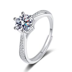 This Silver Starlight Six Claw Moissanite Ring is crafted from sterling silver and set with a dazzling six-claw Moissanite gemstone. This handmade ring is sure to sparkle and shine for years to come. Product Details: Material: 925 Sterling Silver Stone: Moissanite Diamonds/D /1 carat Weight: about 2.72g Size: Adjustable Open Size Diamond Size: 6.5mm SKU: AN23102501 Keywords: moissanite rings, moissanite engagement rings, moissanite ring, moissanite diamond ring, moissanite engagement ring, what Silver Moissanite Ring With Round Cut, Silver Moissanite Crystal Ring, Silver Moissanite Crystal Ring With Round Cut, Silver Moissanite Crystal Ring With Ethical Diamonds, Silver Moissanite Open Ring, Silver Moissanite Open Diamond Ring, Moissanite Open Ring In Silver, Silver Moissanite Solitaire Crystal Ring, Silver Moissanite Solitaire Ring