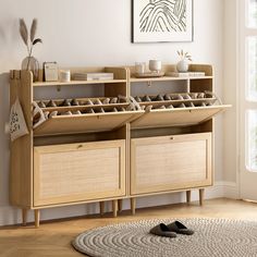 a wooden shelf with baskets and shoes on it in a room next to a rug