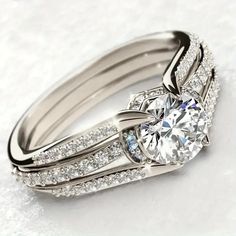 a white gold ring with diamonds on it