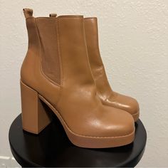 Gb, Gianni Bini Ah-Mazed Style Size 10 Cognac/Camel Brown Nwot Leather Platform Booties Leather Upper Inside Zipper Closure Synthetic Lining Eva Outsole Never Worn Check Pictures For Imperfections Retail- $129.99 5" Shaft 0.75" Platform 4.5" Heel Ref- 001 Brown Trendy Round Toe Heels, Trendy Brown Round Toe Heels, Casual Brown Square Toe Heels, Beige Faux Leather Heels With Round Toe, Brown Ankle-high Platform Heels, Beige Casual Heels In Faux Leather, Brown Faux Leather Ankle Boot Heels, Trendy Brown Faux Leather Heels, Casual Beige Faux Leather Heels