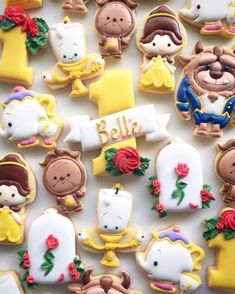 some decorated cookies are sitting on a table