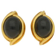 An elegant pair of black onyx cabochon clip-on earrings set in 18k yellow gold. Each earring features an oval cabochon black onyx stone which is set within a fancy ridged yellow gold border. The earrings are secured to reverse with secure omega clip fittings. Posts can be added to the earrings upon request for those with pierced ears. There is an estimated onyx weight of 3.50 carats. They measure exactly 1.7 x 1.1 centimetres and have a combined weight of 7.6 grams. Black Onyx Stone, Stud Set, Antique Earrings, Onyx Stone, Stud Earrings Set, Oval Cabochon, Earrings Set, Jewelry Earrings Studs, Black Onyx