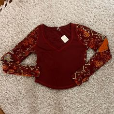 Free People Long Sleeve Garnet Shirt With Embroidered Floral Sleeves Size Medium. V-Neck. New With Tags! Fall Patchwork V-neck Blouse, Fall V-neck Blouse With Embroidered Sleeves, Stretch V-neck Top For Festival, Casual V-neck Top With Embroidered Sleeves, V-neck Festival Tops For Fall, Cotton V-neck Blouse With Embroidered Sleeves, Fall V-neck Patchwork Blouse, Fitted Patchwork V-neck Top, Bohemian V-neck Top With Embroidered Sleeves