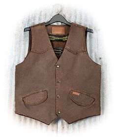 Western Style Montana Vest | Russell's For Men Rugged Brown Vest For Fall, Rugged Winter Vest For Outdoor Activities, Rugged Outdoor Winter Vest, Brown Cotton Vest With Button Closure, Sleeveless Western Outerwear For Fall, Sleeveless Cotton Outerwear With Snap Buttons, Rugged Brown Vest With Pockets, Brown Rugged Vest With Pockets, Rugged Brown Winter Vest