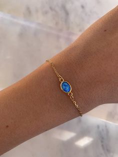 * Stunning 24k gold filled blue opal bracelet with gold filled silicone slider bead to adjust to any size wrist * Delicate & dainty! Stack with a chain bracelet or wear solo * Color of opal evil eye may vary slightly Gold Bracelets Stacked, Gold Chain Bracelet, Bracelet Minimalist, Bracelet Dainty, Opal Bracelet, Delicate Chain, Gold Bracelet Chain, Bracelet Gold, Blue Opal