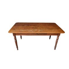 an old wooden table with two legs and a small drawer on one end, against a white background