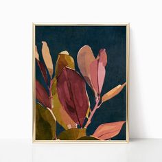 an abstract painting of pink and yellow flowers on a blue background, framed in a gold frame