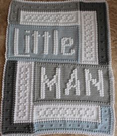 a crocheted blanket with the words little krav written on it