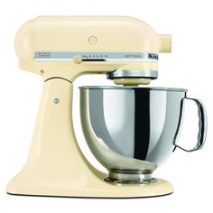 an image of a cream colored mixer on a white background with clippings to the side