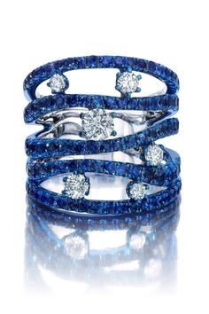 Luxury White Gold Jewelry With Blue Topaz, Luxury Exquisite Sapphire Ring With Diamonds, Luxury Modern White Gold Sapphire Ring, Luxury White Multi-stone Sapphire Ring, Luxury Dazzling Sapphire Ring With Pave Setting, Solitaire Ring Designs, Blue Diamond Jewelry, Cage Ring, Fancy Diamond Ring