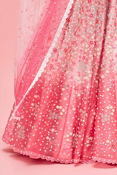 Editor's Note Rose Pink Nishat Bagh Embroidered Ombré Lehenga With Blouse And Dupatta Color: Pink Fabric: Lehenga & Blouse: Organza; Lining: Shantung; Dupatta: Tulle Care: Dry Clean Only About the Designer Nachiket Barve is an award-winning Fashion and Costume designer based in Mumbai, India. He is known for his eponymous label that celebrates Indian tradition with a contemporary and global outlook. Blouse Organza, Embroidered Lehenga, Lehenga Blouse, Designer Outfits, Costume Designer, Mumbai India, Indian Designer Outfits, Indian Designer, Fabric Texture