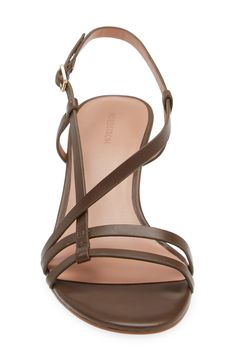 Slender leather straps sweep and swerve across this versatile sandal that'll help refresh your warm-weather ensembles. 3" heel Adjustable strap with buckle closure Leather upper/synthetic lining/rubber sole Imported Leather Open Toe Heels With Straps, Nordstrom Synthetic Sandals For Summer, Nordstrom Synthetic Sandals For Spring, Leather Ankle Strap Heels With Straps, Leather Slingback Heels With Straps, Leather Strappy Slingback Sandals, Leather High Heel Slingback Sandals With Straps, Leather Strappy High Heel Sandals, Leather Slingback Heels With Adjustable Straps