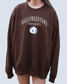 ✰Embroidered✰UNISEX✰Hand drawn and designed✰50% cotton, 50% polyester✰Super soft and comfy!✰Model is 5'5 and wearing Size XL in a Brown Sweatshirt with tan thread. The thread change will only be changing the color for "HALLOWEENTOWN UNIVERSITY". For black hoodies/sweatshirts, the black thread of the skull outline will be a dark grey instead so you can still clearly see the outline! Skull Outline, Halloweentown University, Matching Hoodies, Brown Sweatshirt, Custom Matches, Embroidery Hoodie, Embroidery Shoes, Halloween Embroidery, College Hoodies