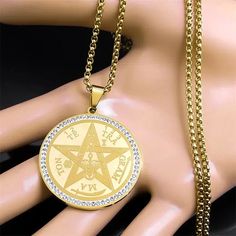 Enhance your style with gorgeous Wicca Amulet Pentacle Necklace - crafted of stainless steel in striking steel and gold hues, with mesmerizing Rhinestone accents! Opting for stainless steel ensures these earrings are rust-proof, allergy-free, won't lose their shape, and won't discolor - plus, its anti-acid and anti-alkali properties guarantee a lasting look. Summon a magical, witchy vibe with these ravishing Witchcraft necklaces! 🔮 Symbolic Metal Clavicle Chain Jewelry, Symbolic Stainless Steel Pendant Jewelry, Symbolic Yellow Gold Metal Jewelry, Symbolic Yellow Gold Jewelry, Nickel-free Gold Alloy Necklaces, Gold Alloy Necklaces Nickel Free, Stainless Steel Dangle Clavicle Chain Jewelry, Stainless Steel Clavicle Chain Dangle Jewelry, Gold Nickel-free Alloy Necklace