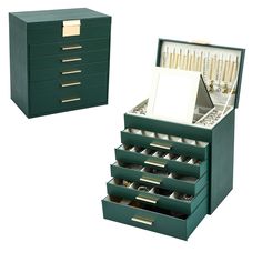 two green drawers with gold handles on each side and an open drawer in the middle