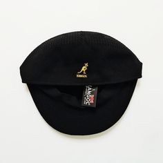 2000s BLACK KANGOL BERAT. BRAND NEW WITH TAGS  Vintage 2000s black Kangol hat / Kangol Beret / Kangol flat cap.  Embroidered yellow Kangol logo. FULLY TRACKABLE SHIPPING SERVICE. UK AND WORLDWIDE SHIPPING. Classic Black Visor Fitted Hat, Classic Black Fitted Visor Hat, Classic Black Fitted Hat With Visor, Casual Black Beret Cap, Black Casual Beret, Casual Black Beret, Beret Kangol, Kangol Caps, Kangol Hat