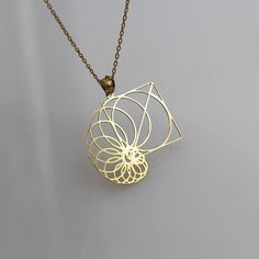 Fibonacci 14k 18k Real Gold Necklace Pendant - Geometric Jewelry - Geometric Pendant - Gold in Fibonacci ▶ 14K Solid Gold (585) ▶ 18K Solid Gold (750) ▶ Options: White,Rose,Yellow ▶ You can buy this necklace without chain. ABOUT NECKLACE Handmade with 14k/18k solid real gold. You can order this Fibonacci  gold  necklace with 3 different color options, 5 different necklace length options and free & express shipping to the all-around the world. What is 14k Gold? 14K gold is a mixture which primarily consists of gold that is blended with durable metals such as zinc, nickel, and copper. Gold by itself is relatively soft, so the alloy metals are to strengthen the composition. 14 Karat specifically refers to the metal mixture that is 58.5% gold. To understand whether it is made with 14K gold or Gold Spiral Jewelry With Polished Finish, Unique Spiral Yellow Gold Jewelry, Unique Yellow Gold Spiral Jewelry, Spiral Yellow Gold Necklace For Gift, Luxury Spiral Jewelry As A Gift, Luxury Spiral Jewelry For Gift, Luxury Spiral-shaped Jewelry Gift, Luxury Spiral Jewelry Gift, Modern Gold Spiral Jewelry