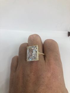 Hand made vintage filigree ring All pave set Cubic Zirconia in gold finished Sterling Silver My jeweler can re size for a $10-$20 fee All rings are shipped free in the US in a nice gift box. Check out our over a THOUSAND great reviews Engraving is $4 per letter and is not always perfect depending on the piece. It can take a few days if the jeweler is busy. This is payable to Paypal Judithsltd@gmail.com Gold Cubic Zirconia Jewelry For Proposal, Gold Cubic Zirconia Rings For Proposal, Fine Jewelry Gold Crystal Ring For Proposal, Gold Cubic Zirconia Rectangular Rings, Rectangular Gold Cubic Zirconia Rings, Gold Jewelry With Prong Setting And Radiant Cut, Elegant Gold Rectangular Crystal Ring, Gold Rectangular Crystal Ring, Gold Rectangular Diamond Ring With Prong Setting