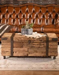 a trunk coffee table sitting in front of a couch