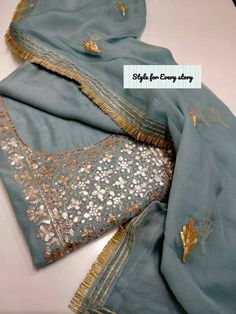 Item Overview ATHARVA Hand Embroidery Salwar Kameez /Neck & Foil Work Shirt Grey Blue/Gota Patti Chiffon Dupatta/Custom Stitch Unstitch/Gift/Plazo Dno. CH1646 🌷Fabric: * Shirt: Chanderi Silk - 2.5 Mts- Hand Embroidery Neck Work * Dupatta: Chiffon Chinnon Dupatta/Hand Embroidery Gota Patti Dupatta/2.5Mts * Bottom: Santoon Taffeta Silk Salwar 2.5 Mts. 🌷CUSTOMIZATION (No Extra Charges) * Fabrics Customization: Designs Can be made in different Fabrics. *Color Customization: Designs Can be made in Blue Georgette Sharara With Gota Work, Embroidered Georgette Sharara With Straight Kurta, Blue Georgette Anarkali Set With Gota Work, Unstitched Designer Blouse Piece With Gota Work, Unstitched Gota Work Blouse Piece For Designer Wear, Unstitched Georgette Sharara With Gota Work, Blue Georgette Kurta With Sheer Dupatta, Blue Dola Silk Kurta With Mirror Work, Blue Blouse Piece With Gota Work For Diwali