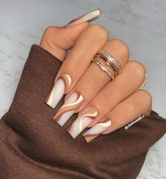 Discover sophisticated brown and white swirl nails. Perfect for your next salon visit. Includes short and almond designs. Save to your Nails board and read more! Brown Acrylic Nails, Her Nails, Simple Acrylic Nails, Short Square Acrylic Nails, Long Acrylic Nails Coffin, Unique Acrylic Nails, Long Square Acrylic Nails, Acrylic Nails Coffin Short