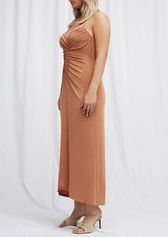 Designed by Significant Other. An elevated silhouette, the Rosie Midi Dress in Caramel is perfect for your events this season. Featuring our signature jersey fabrication, this style features ruched detail down the bodice, gathered fabrication at the bust and plunging back line with strap cross over detail. Fit: Model 1 wears a size 12AU / 8US. Model 2 is 183cm / 6″ wearing an AU 8 / US 4. Materials + Care: 95% Polyester, 5% Elastane. Please Note: This item is final sale and cannot be returned. F Significant Other, Final Sale, Caramel, Bodice, Midi Dress, How To Wear