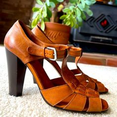 Gorgeous Italian Made Cole Haan Collection Brown Leather Sandals With Sexy 4" Heel. Size 9b, Fits Like 9.5/10. Lovely Leather Insole. Floor Model, Never Worn Outside Of Store. Excellent Condition, Some Floor Model Pen Marks Inside And On Sole And Some Marks On Soles From Stickers, Otherwise Like New. Please See Pics! Brown T-strap Heels For Party, Brown Leather T-strap Heels, Summer Leather Heels With 4-inch Heel, Spring T-strap Heels With Leather Sole, Retro T-strap Heels With Heel Strap, Spring T-strap Heels With 4-inch Heel, Brown High Heel T-strap Sandals For Spring, Brown High Heel T-strap Sandals With Heel Strap, Brown T-strap Heels With Buckle Closure