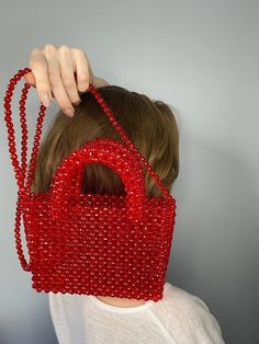 Aesthetic tote bag for woman. Vintage pearl beaded red retro bag that will decorate your Valentine's day.  🔥PROCESSING TIME 3-4 days MATERIAL: Crystal red beads 8mm. With every pearl bag you'll get GIFT 🎁 In addition to the gift, a hand-signed POSTCARD with a message from the purse is attached to the order✉ If this is a present, be sure to write me the name of the recipient✒ More pearl bags: https://www.etsy.com/shop/VitakaJewelry?ref=seller-platform-mcnav&section_id=29560344 Please be aware that some countries impose customs fees and taxes for packages that enter your country.  These fees are kept by your government and outside of your purchase with me. *If you are running out of time, use FAST DELIVERY. Write me directly please. Large Capacity Evening Shoulder Bag As Gift, Large Capacity Shoulder Evening Bag As Gift, Large Capacity Shoulder Evening Bag, Large Capacity Top Handle Box Bag As Gift, Rectangular Evening Bag With Large Capacity For Gift, Chic Evening Bag With Large Capacity For Gift, Trendy Top Handle Box Bag Gift, Trendy Handheld Box Bag Gift, Chic Large Capacity Evening Bag For Gifts