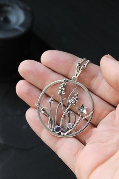 ITEM DESCRIPTION: The size H 4 cm x W 4 cm (1 2/3 x 1 2/3 inch). Weight - 5 g. You can buy it with a silver chain or without it. I made these pretty garden flowers of sterling silver, iolite, and blue topaz. Muscari is a really lovely delicate spring flower. And this floral jewelry will be a great addition to your jewelry collection or gift for someone whose you love. I can make this with other stones, just write to me - I'm always open to custom orders. This handmade necklace will come to you i Silver Circle Jewelry With Birthstone, Silver Nature-inspired Round Pendant Jewelry, Nature-inspired Jewelry With Large Round Pendant, Silver Round Pendant Jewelry With Nature-inspired Style, Silver Circle Gemstone Jewelry, Jewellery Project, Plant Necklace, Jewelry Hacks, Silver Metal Clay