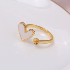 Material: Bronze. Quantity: 1 Pcs .  (please note : bead is not included) Shipping: international shipping may take 2 to 4 weeks.  please give some patience, thank you for your understanding. If you have any questions, please feel free to contact me. White Heart Ring For Gift, Heart Shaped Beaded Heart Ring, Heart Shaped Bead Ring Gift, Heart-shaped Heart Beads Ring For Gifts, White Heart Charm Ring For Valentine's Day, White Rings With Heart Charm For Valentine's Day, White Ring With Heart Charm For Valentine's Day, Dainty White Adjustable Heart Ring, White Rings For Valentine's Day