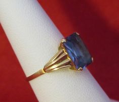 An Original 1960's Swedish 18 Kt Yellow Gold Blue Topaz Ladies Ring - Blue Beauty (Size 6). Visit this shop for a wide variety of Vintage Quality Jewelry, Art, and Collectibles. ~Age (approximate): 1960's ~Material(s): 18 Karat Yellow Gold ~Approx. Size: 6 ~Approx. Weight: 1.4 dwt ~Signature / Brand: Unsigned. ~Condition: Very Good. ~International Shipping: Is Available, please contact us for a quote. ~Inventory #: 6129 Blue Beauty, Ladies Ring, Square Pendant, Ring Blue, Family Set, Blue Rings, Vintage 1950s, Quality Jewelry, Blue Topaz