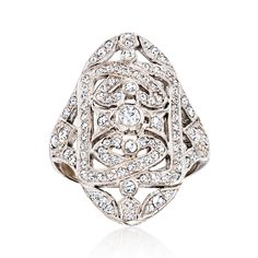 Ross-Simons - C. 1980 Vintage .80ct t. w. Diamond Openwork Ring in 18kt White Gold. Size 6. C. 1980. Before you is one of the finest treasures to enter the vaults of our Estate collection. This substantial 1" wide cocktail ring features intertwined geometric shapes, dazzled by .80 ct. t. w. round brilliant-cut diamonds. The top design continues onto the chic tapered band, all crafted in polished 18kt white gold. Note the fancy openwork throughout, adding to the intrigue of this certain heirloom. Platinum Diamond White Ring For Evening, White Gold Diamond Cut Ring For Evening, Platinum Diamond Cut Rings For Evening, Classic Collectible Rings With Diamond Accents, Classic Rings With Diamond Accents For Collectors, Evening Diamond Ring With 17 Jewels, Silver Diamond Ring With Single Cut Diamonds For Evening, Diamond White Rings With Single Cut Diamonds For Evening, Collectible Platinum Diamond Ring In Diamond White