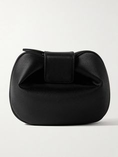 Gabriela Hearst pays close attention to the particular shape and structure of each bag, and this 'Soft Demi' clutch is certainly distinctive. Made from black satin, it has a slouchy, spherical design with a folded top. Secure your cards, keys and lipstick inside. Modern Black Evening Pouch, Black Leather Evening Pouch, Modern Structured Clutch For Formal Occasions, Black Leather Clutch For Formal Occasions, Formal Black Leather Clutch, Black Evening Pouch With Dust Bag, Black Office Clutch With Magnetic Closure, Designer Black Evening Bag For Events, Black Versatile Clutch For Office