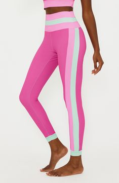 Sherbet-hued colorblock panels at the high waist and sides of these ultrasoft, ribbed second-skin leggings bring a sweet twist to a workout essential. Pull-on style 86% polyester, 14% spandex Machine wash, tumble dry Imported Spring Athleisure Pants With Contrast Stripes, Activewear With Elastic Side Panels For Spring, Athleisure Pants With Contrast Stripes For Spring, Stretch Bottoms With Contrast Trim For Loungewear, Sporty High Waist Leggings For Spring, Spring Activewear With Elastic Side Panels, Stretch Bottoms With Contrast Trim For Sports, Stretch Sports Bottoms With Contrast Trim, Sporty Leggings With Ribbed Waistband