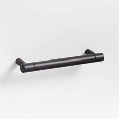 an image of a black towel bar on the wall