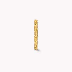 Crafted from the finest yellow gold, our sleek and slender 2.3mm Laurence Graff Signature band is set with pavé yellow diamonds, with each angular facet displaying exceptional brilliance. The elegant, angled contours are a striking interpretation of the facets of a diamond - a stone that is synonymous with the House of Graff. Jewels in the Laurence Graff Signature collection include sleek and stackable bands and bangles, stylish earrings, playful pendants and rings designed to whirl upon the fin Yellow Gold Eternity Band With Pave Setting, Timeless Gold Eternity Band With Diamond Cut, Luxury Gold Diamond-cut Eternity Band, Luxury Gold Diamond Cut Eternity Band, Luxury Gold Eternity Band With Diamond Cut, Wedding Rings And Bands, Rings And Bands, Graff Diamonds, Signature Rings