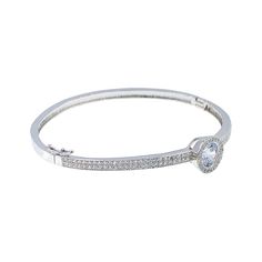 Bezel-set crystals lend glamorous sparkle to a super-shiny bangle that's perfect for stacking with other bracelets for a trendy, customized look. Inner diameter: 2.36" (6 cm) White gold plated Fold-over clasp closure Stackable Silver Cubic Zirconia Bracelets Channel Set, Silver Cubic Zirconia Bracelet Channel Set, Sparkling Cubic Zirconia Round Bracelets, Stackable Cubic Zirconia Bracelet Jewelry, Classic Stackable Cubic Zirconia Bracelets, Stackable Cubic Zirconia Bracelet, Classic Bling Bracelets, Classic Bling Bracelet, Classic Bracelets With Bling In Cubic Zirconia