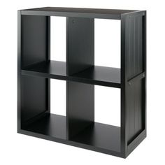 a black bookcase with three shelves on each side