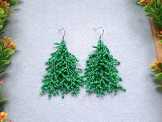 Check out this item in my Etsy shop https://www.etsy.com/listing/1103578128/christmas-tree-bead-earrings-green-tree Green Beaded Earrings For Holidays, Christmas Seed Bead Fringe Earrings, Christmas Tree Seed Bead Earrings, Christmas Tree Bead, Christmas Green Dangling Beads Earrings, Beaded Christmas Tree Earrings, Seed Bead Fringe Earrings, Christmas Tree Beads, Bead Fringe Earrings