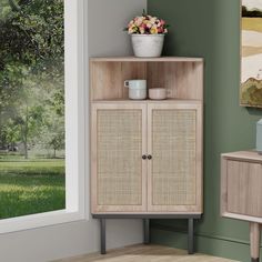 a cabinet with two doors and a basket on top is in the corner of a room