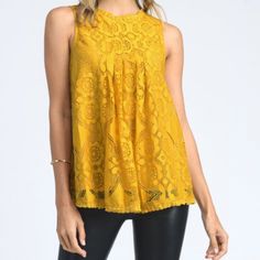 Sunflower Yellow Lace Top. Doe & Rae Sleeveless Blouse. Lace Overlay With Pleated Bust. Scalloped Decorative Trim. Rounded Neck. Rear Upper Keyhole With Button. Swing Silhouette. Nwt Never Worn, No Flaws. Size Small Approximate Measurements... Pit To Pit Lying Flat: 17” Length: 24” Easter Spring Summer Sunshine Career Casual Cute Yellow Lace Top Yellow Lace Tops For Summer, Sleeveless Lace Tank Top For Spring, Chic Sleeveless Lace Tank Top, Elegant Yellow Sleeveless Blouse, Elegant Sleeveless Yellow Blouse, Spring Lace Sleeveless Tank Top, Summer Sleeveless Lace Top For Party, Summer Party Sleeveless Lace Top, Lace Sleeveless Vest Top