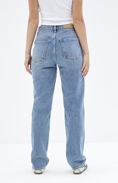 Elevate your casual look with the Medium Indigo Dad Jeans from PacSun, combining retro style with modern comfort. Sitting high on the waist, these high-waisted jeans feature a slightly oversized, slouchy fit through the hip and thigh with a straight leg cut, perfect for a relaxed yet stylish vibe.   	Model is wearing a size 26 	Model measurements: 5’7” height, 32” bust, 23” waist, 34” hip Jeans Pacsun, Closet Tour, Jeans Outfit Women, Fashion Top Outfits, Buy List, Dad Jeans, Straight Cut Jeans, Curve Jeans, Fashion Top