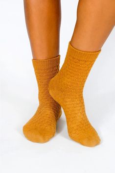 Thermal, yellow/orange ankles are a midweight premium pair of socks featuring a knitted sweater-like design throughout. The thicker knit blend will keep your feet warm and steps soft. Size: + OSFA, W 7-10 Design: + 96 Needle + Mid weight + Reinforced toe & heel + Seamless toe + Sweater knit + Tall ankle Content + Care: + Premium Combed Cotton + Wash Cold/Dry Low + Imported Created by Tailored Union. Casual Cheap Orange Socks, Cheap Casual Orange Socks, Knit Ankle Socks, Ankle Sock, Madewell Jeans, Ankle Socks, Socks Women, Combed Cotton, Wearable Art