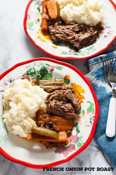 two plates with meat and mashed potatoes on them