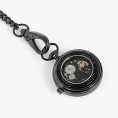 The extraordinary skeleton movement and inner mechanisms are showcased through a highly-polished glass case featuring 17 intricately placed jewels and made from brass with IP black coating. A built in safety mechanism ensures excessive winding will not damage the movement and each time the watch is fully winded, it will last for 30+ hours. Our pocket watch comes with a pocket chain finished with lobster clasps and a keyring loop to be worn in your pocket or stand alone. The perfect luxury gift t Skeleton Movement, Pocket Chain, Hand Wound, Glass Case, Unisex Gifts, The Movement, Luxury Items, Pocket Watch, Mens Gifts