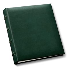 a green leather book on a white background with clippings to the front cover