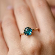 London Blue Topaz Ring 14K Gold - Prong Solitaire Natural Gemstone Ring for Women - Kyklos Jewelry ● Metal: 14K solid gold, 14K white gold or 14K rose gold ● Gemstone: London Blue Topaz, briolette cut ● Stone Diameter: 8 mm (0.3 in) ● Choose from the drop down menus the available options (Material, Ring size) and leave us a note for any special requirements. ● All our pieces are delivered beautifully packaged and gift ready, with a certificate of authenticity for the metal and the stone. Please Neelam Ring, London Blue Topaz Ring, Natural Gemstone Ring, Chevron Ring, Jewelry Metal, Gold Ring Stack, Fedex Express, Amethyst Necklace, Unique Gemstones